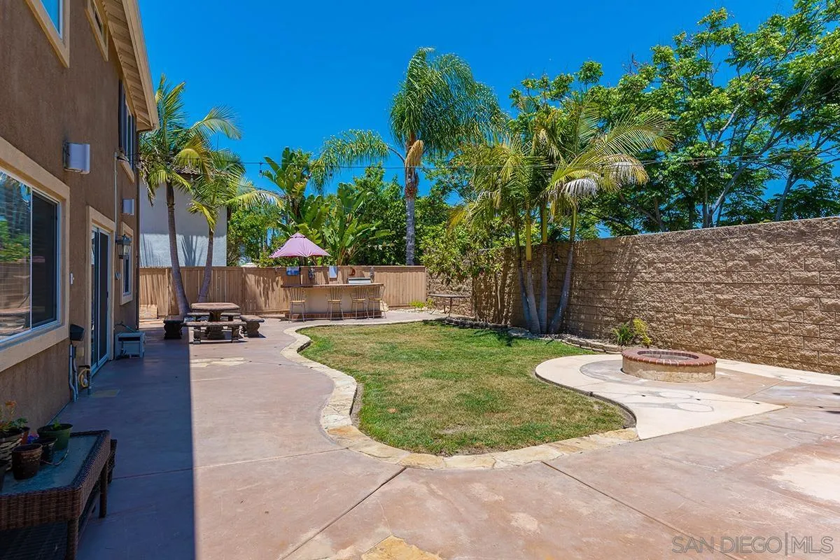 304 River Ranch Way Oceanside, CA 92057 - Photo 18 of 44 a view of backyard with swimming pool and sitting area