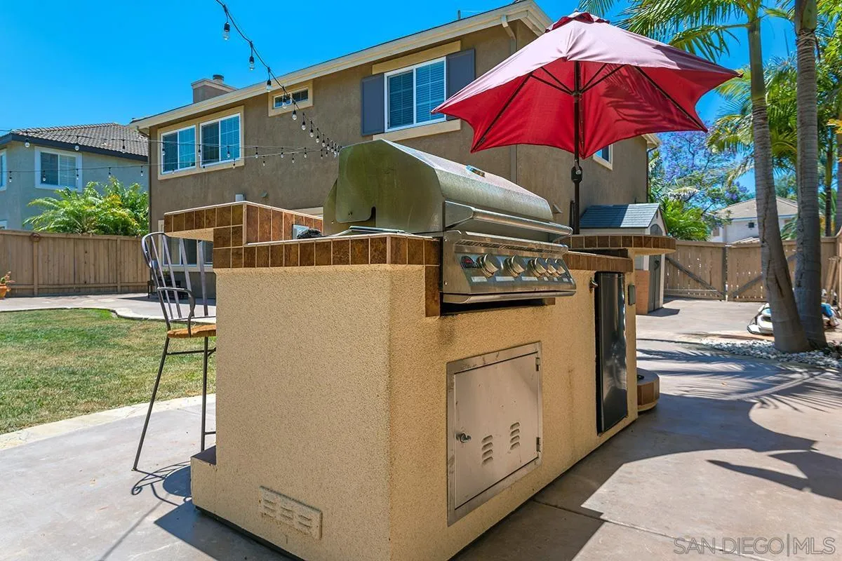 304 River Ranch Way Oceanside, CA 92057 - Photo 25 of 44 a view of a house with backyard and sitting area