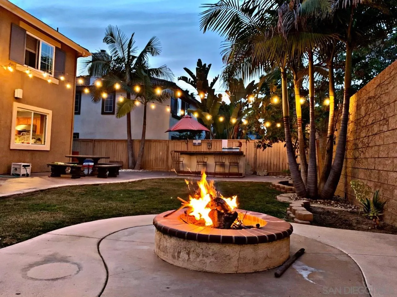 304 River Ranch Way Oceanside, CA 92057 - Photo 27 of 44 a outdoor view with a fireplace and plants