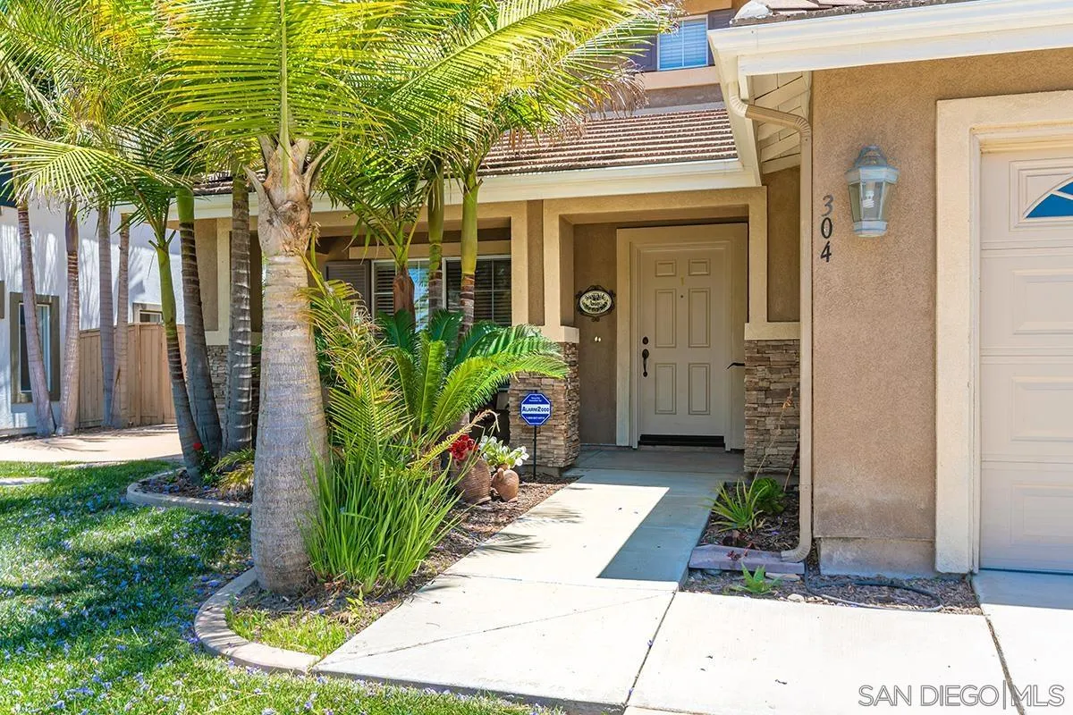 304 River Ranch Way Oceanside, CA 92057 - Photo 32 of 44 a view of a potted plants in front of a house