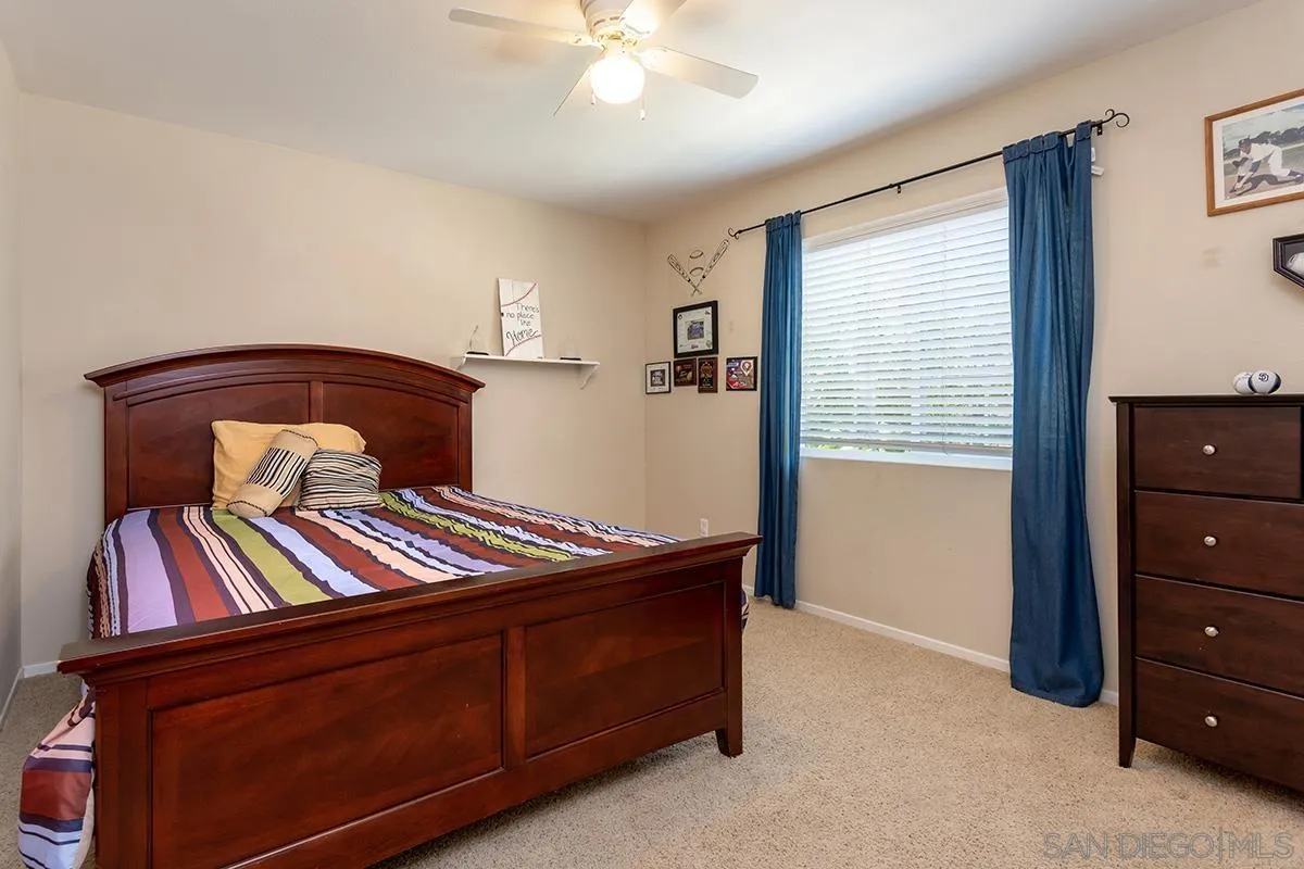 304 River Ranch Way Oceanside, CA 92057 - Photo 39 of 44 a living room with furniture and a window