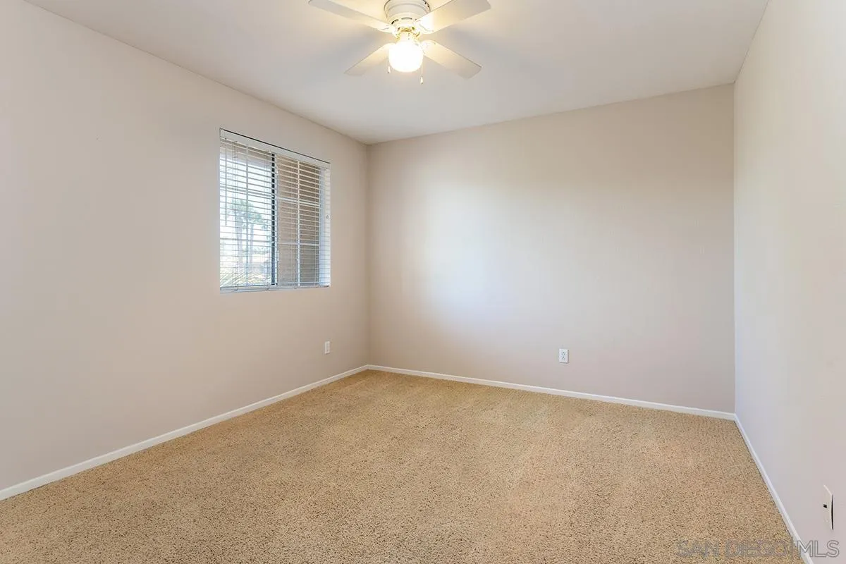 304 River Ranch Way Oceanside, CA 92057 - Photo 40 of 44 an empty room with a window