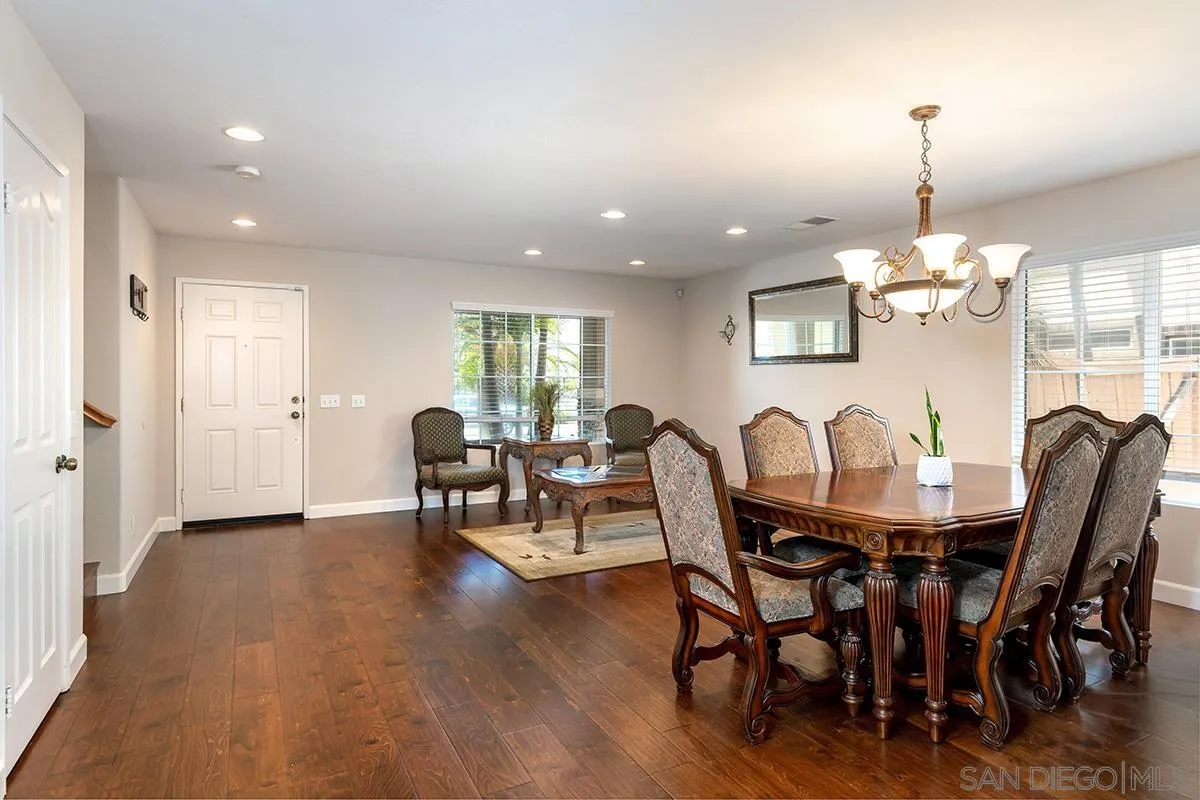 304 River Ranch Way Oceanside, CA 92057 - Photo 41 of 44 a view of a dining room with furniture window and wooden floor
