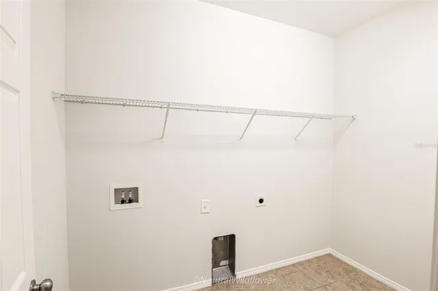 a view of a hallway with a bathroom