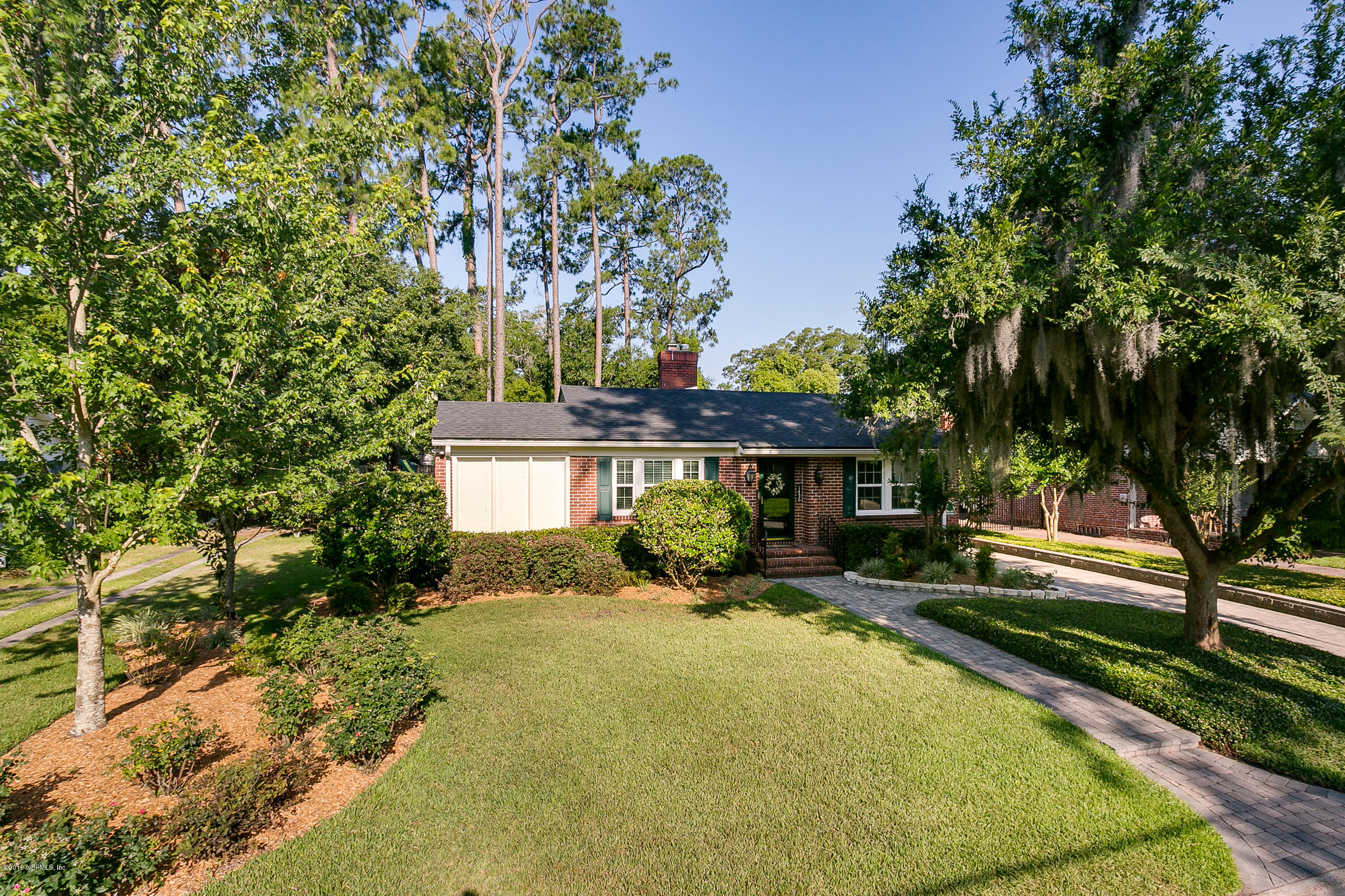 1456 Nicholson Road Jacksonville, FL 32207 - Photo 2 of 27 a front view of a house with a yard