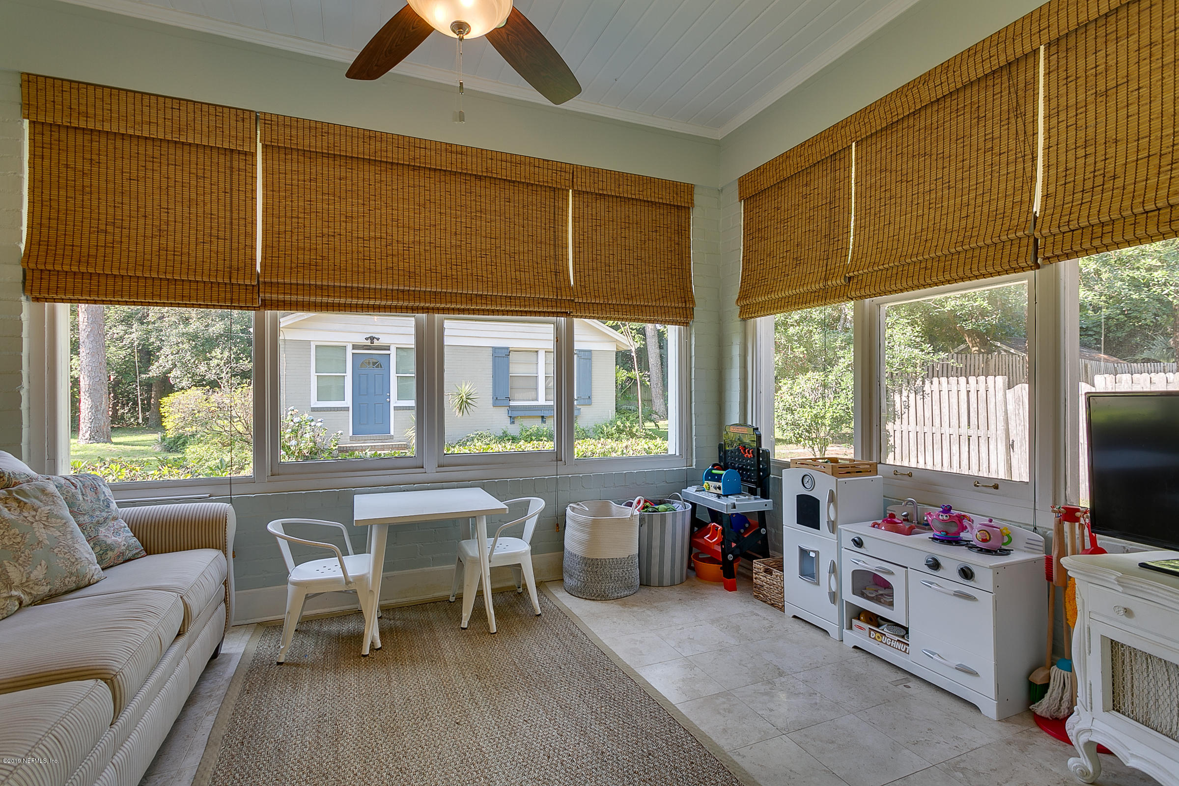 1456 Nicholson Road Jacksonville, FL 32207 - Photo 8 of 27 a view of a livingroom with workspace and a window
