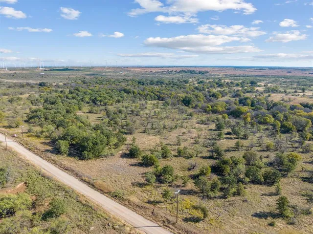 a view of a city with lots of trees