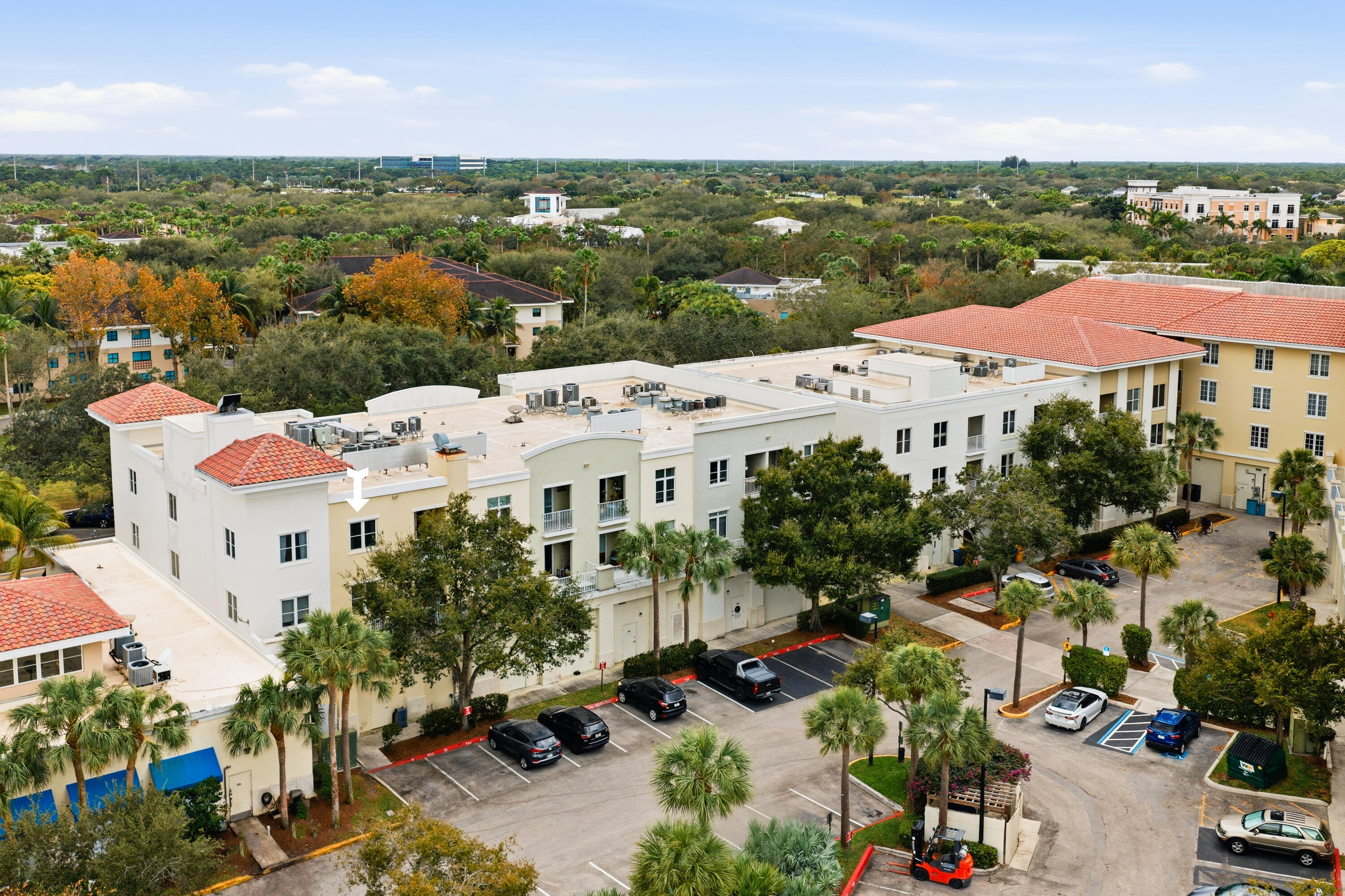 1209 Main Street, Unit 301 Jupiter, FL 33458 - Photo 17 of 24 Drone back of bldg