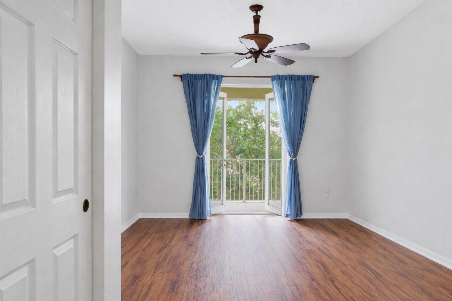 1209 Main Street, Unit 301 Jupiter, FL 33458 - Photo 6 of 22 Primary bedroom with step out balcony