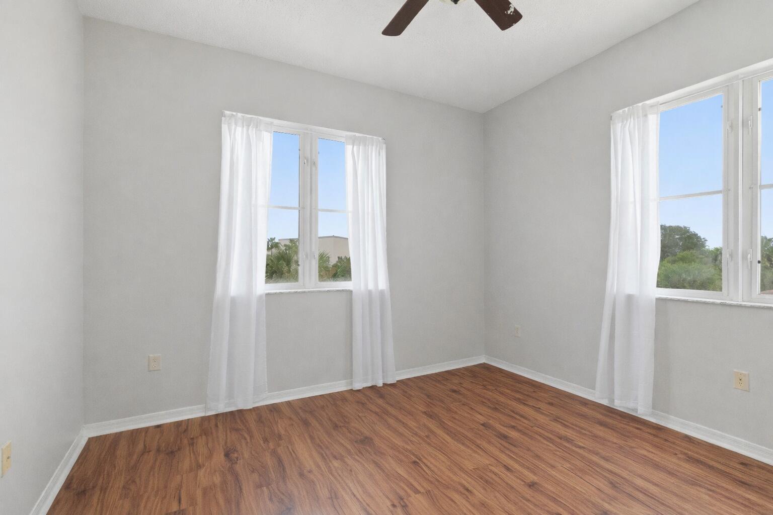 1209 Main Street, Unit 301 Jupiter, FL 33458 - Photo 9 of 22 Guest bedroom