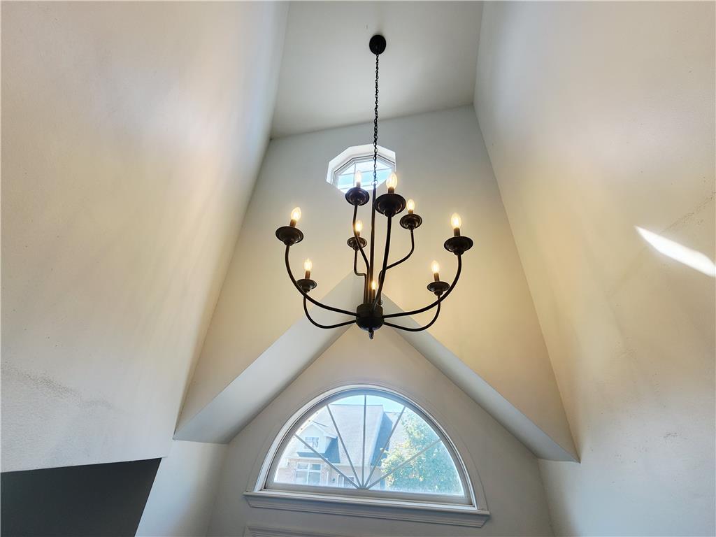 237 Ridings Circle Macungie, PA 18062 - Photo 13 of 70 Dramatic high ceilings and architectural windows frame an elegant iron chandelier.
