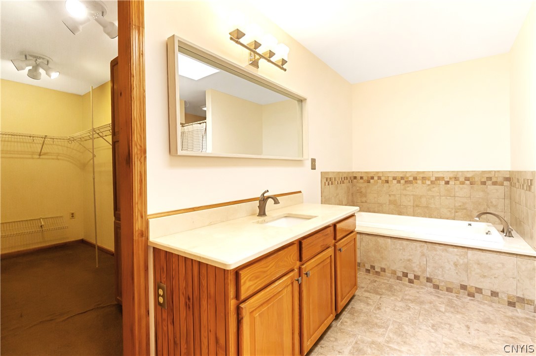 3225 Groth Road LaFayette, NY 13084 - Photo 19 of 47 it features a walk in closet, jetted tub