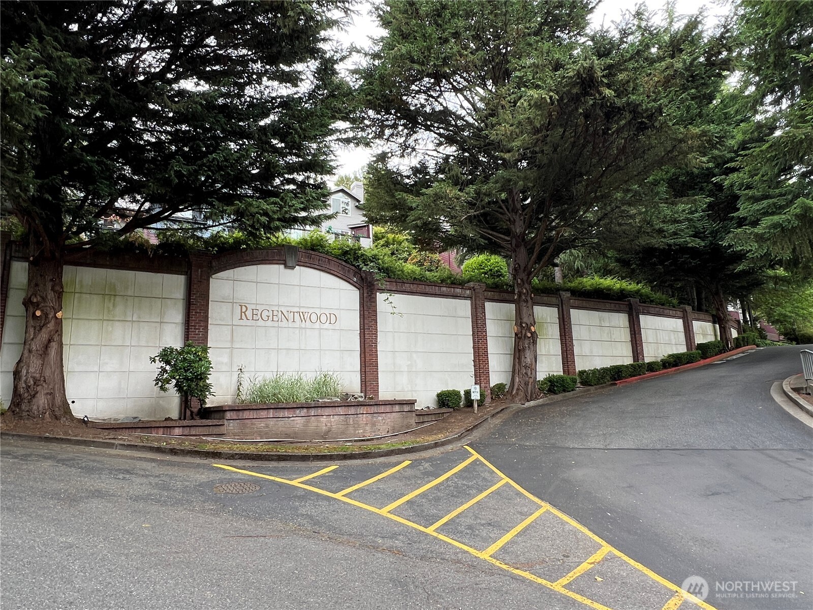15711 Waynita Way Northeast, Unit H106 Bothell, WA 98011 - Photo 14 of 20 a front view of a house with a yard and garage