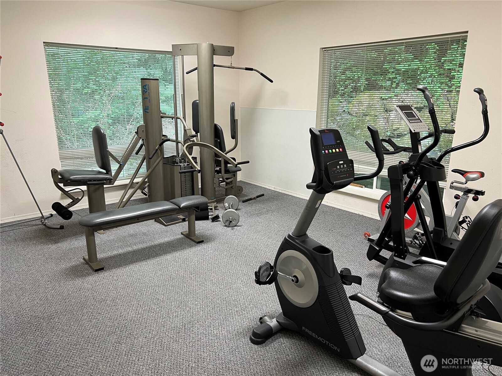 15711 Waynita Way Northeast, Unit H106 Bothell, WA 98011 - Photo 17 of 20 a view of a room with gym equipment