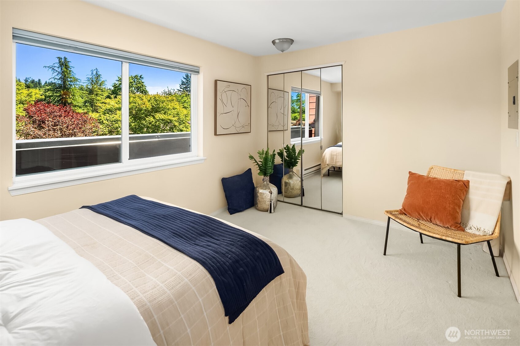 15711 Waynita Way Northeast, Unit H106 Bothell, WA 98011 - Photo 8 of 20 a bedroom with a bed and a chair