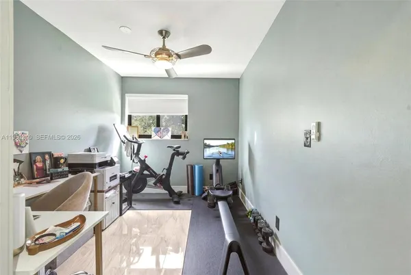 a view of a room with gym equipment