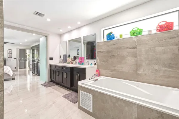 a front view of house with yard swimming pool and outdoor seating