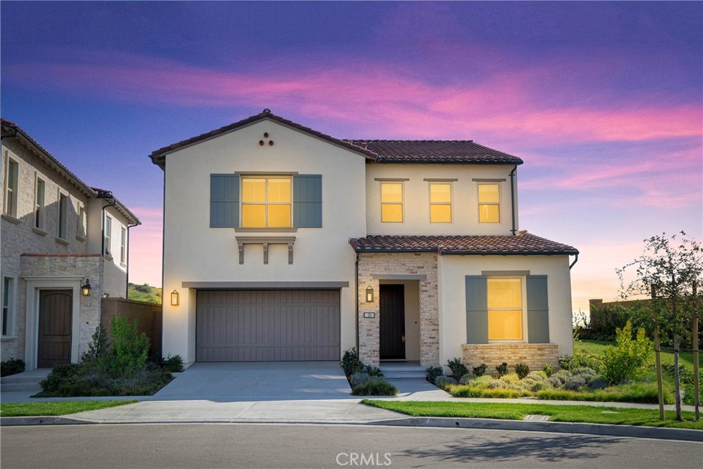 100 Mossvine Irvine, CA 92618 - Photo 25 of 26 a front view of a house with yard