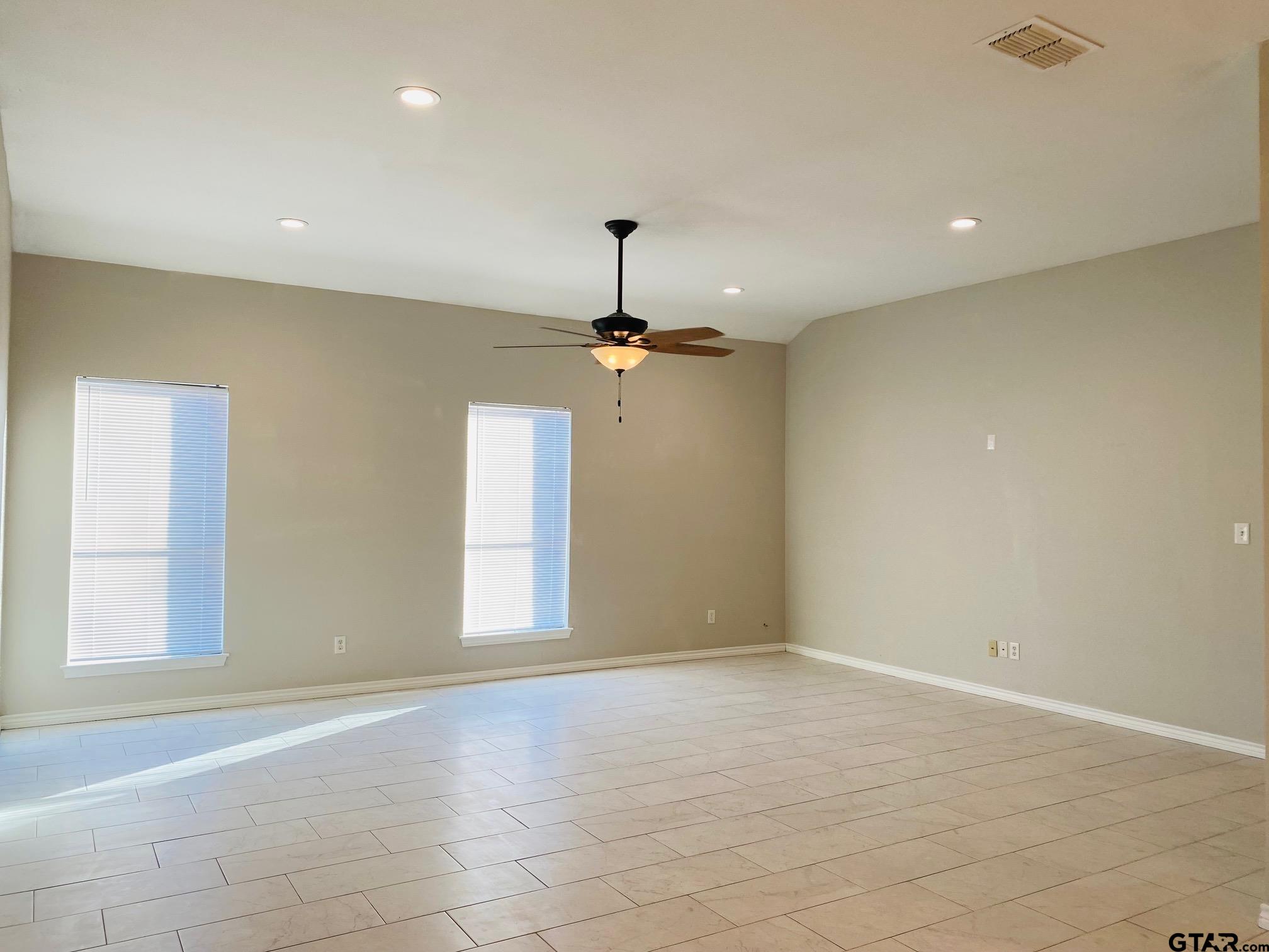 19586 FM 2493 Flint, TX 75762 - Photo 2 of 15 wooden floor in an empty room with a window