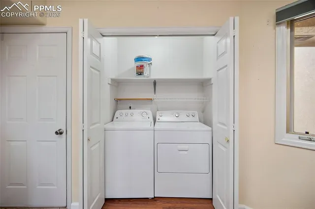 a utility room with dryer and washer