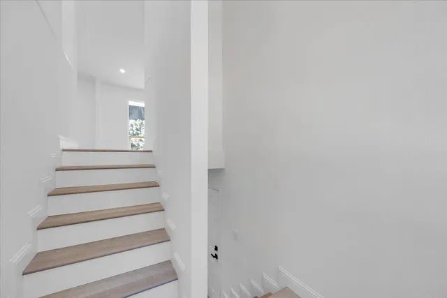 a view of balcony with wooden floor