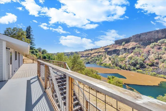 a bathroom with a sink a mirror and shower