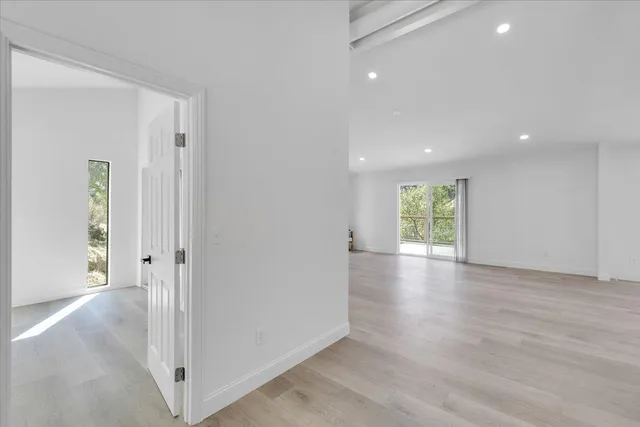 a view of a lake with a yard