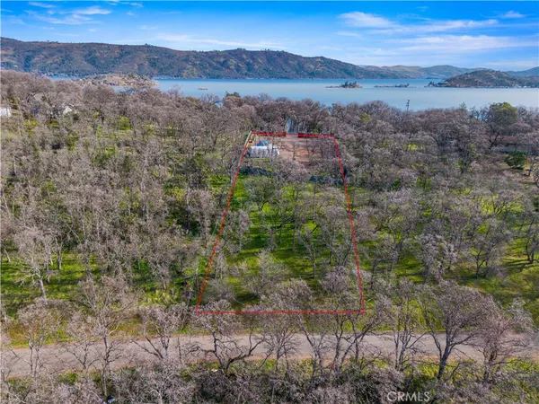 an aerial view of residential house and outdoor space
