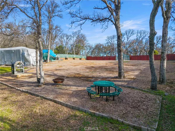 a view of a park with swings and slides