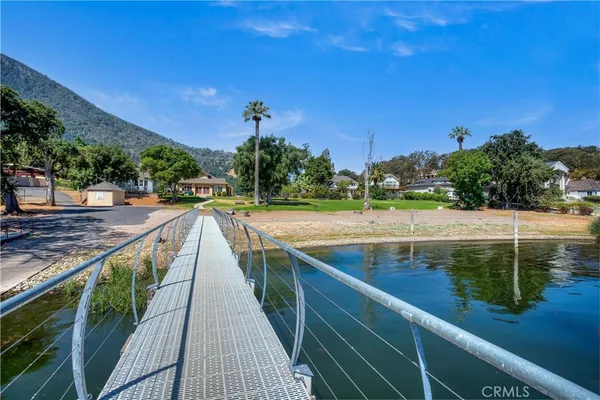 a view of swimming pool from a balcony