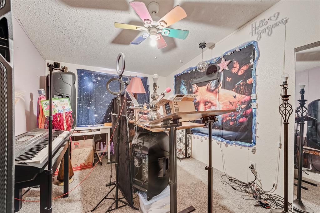 501 Billings Road Tolar, TX 76476 - Photo 12 of 22 a view of a room with gym equipment