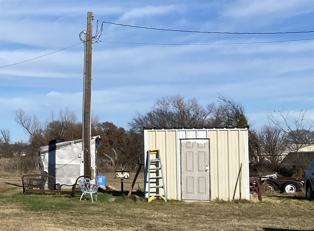 501 Billings Road Tolar, TX 76476 - Photo 16 of 22 a view of a house with a yard