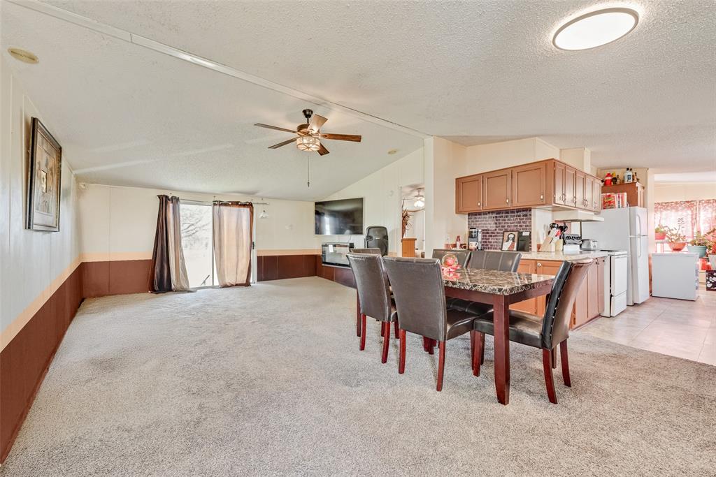 501 Billings Road Tolar, TX 76476 - Photo 2 of 22 a view of a dining room with furniture and a livingroom