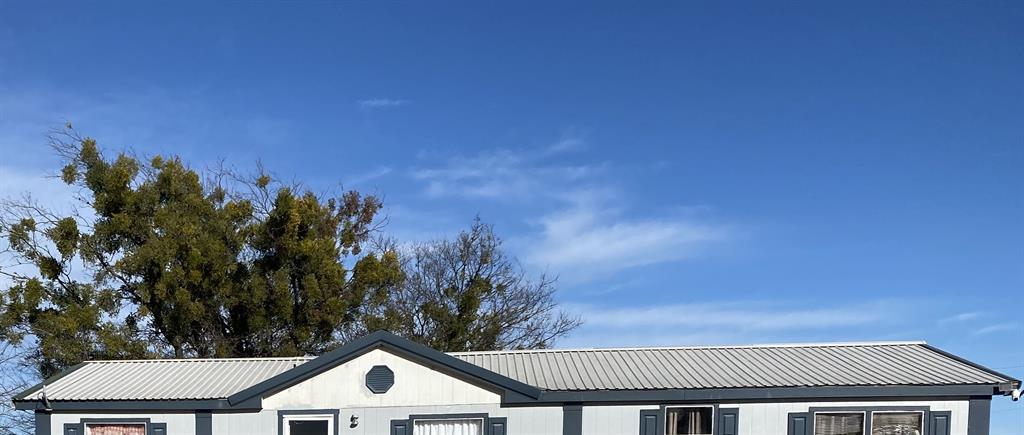 501 Billings Road Tolar, TX 76476 - Photo 22 of 22 a front view of a house with a garden