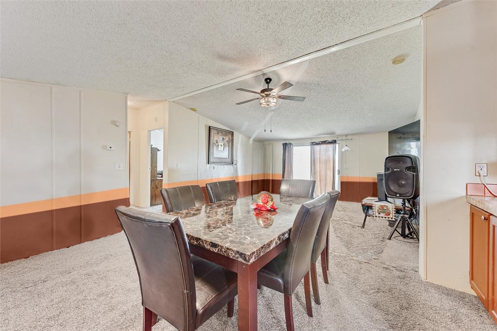 501 Billings Road Tolar, TX 76476 - Photo 4 of 22 a view of a dining room with furniture