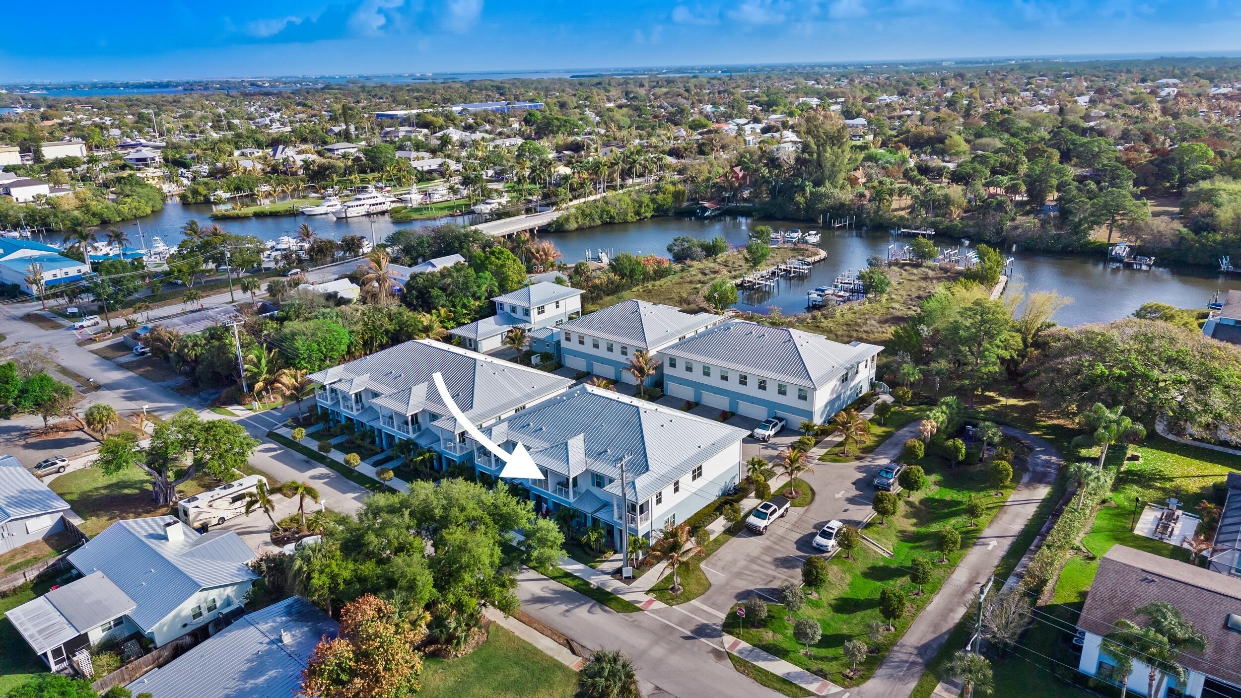 4692 Southeast Manatee Terrace Stuart, FL 34997 - Photo 35 of 47 an aerial view of multiple house