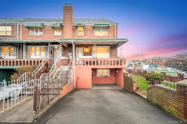 a front view of a house with a garage