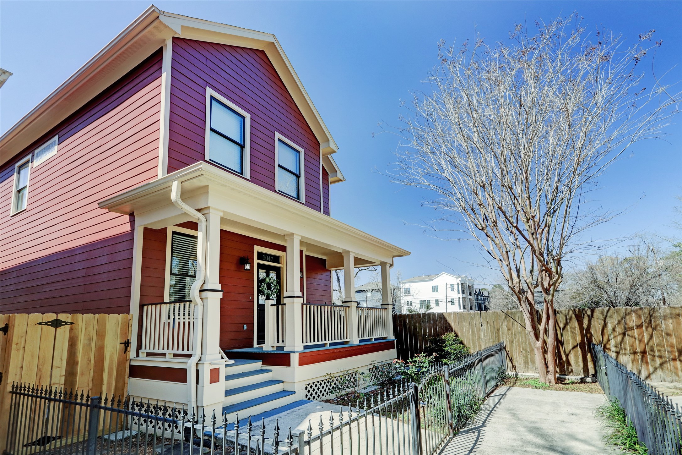 a front view of a house with glass windows