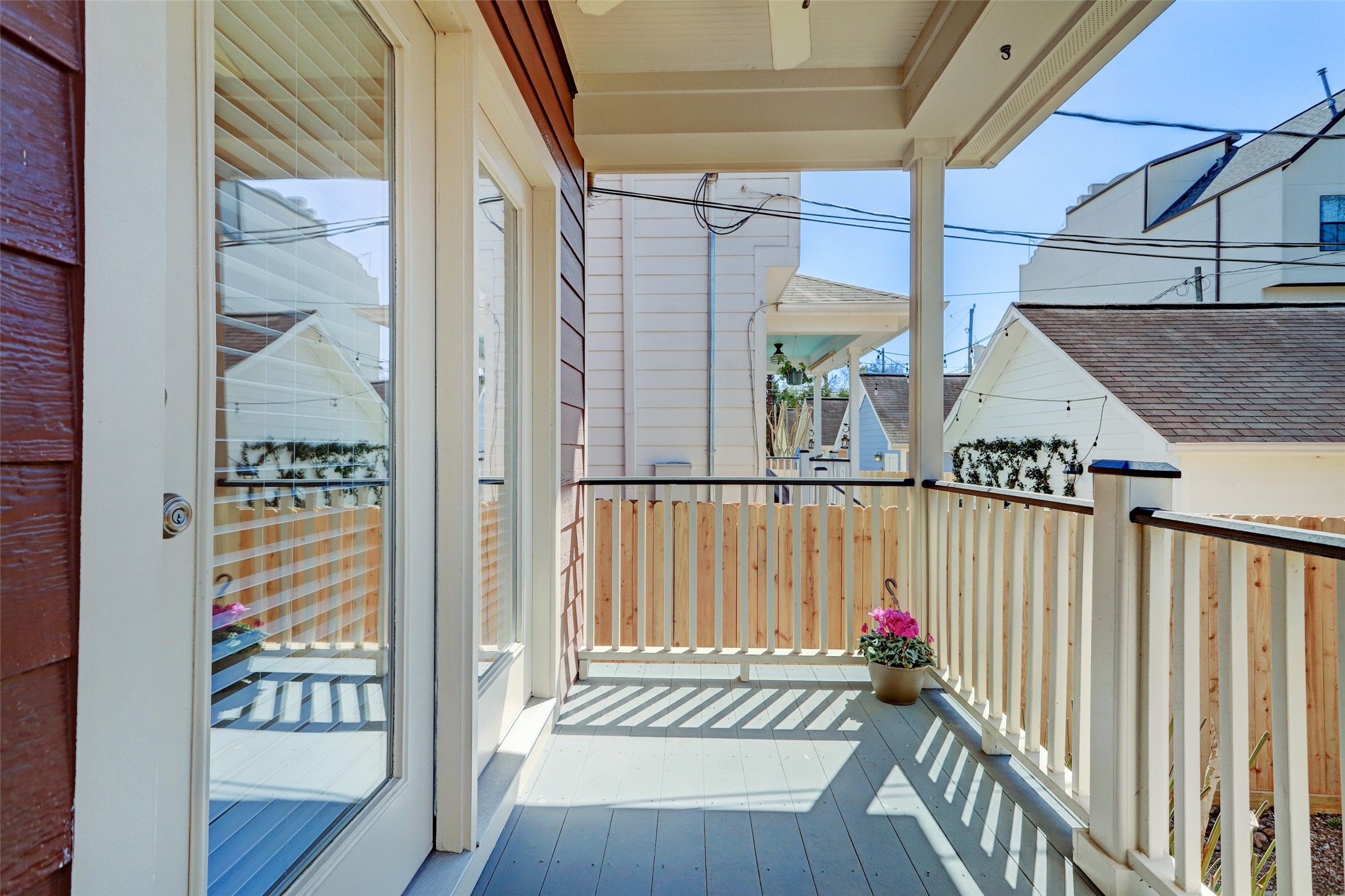1047 West 16th Street Houston, TX 77008 - Photo 27 of 36 a view of a balcony with wooden floor
