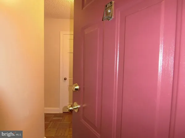a view of a bathroom with a shower curtain