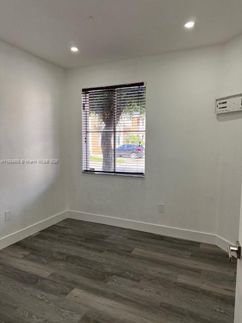 17820 Northwest 73rd Avenue, Unit 1011 Hialeah, FL 33015 - Photo 7 of 22 a view of wooden floor and windows in a room