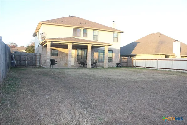 a front view of a house with a garage