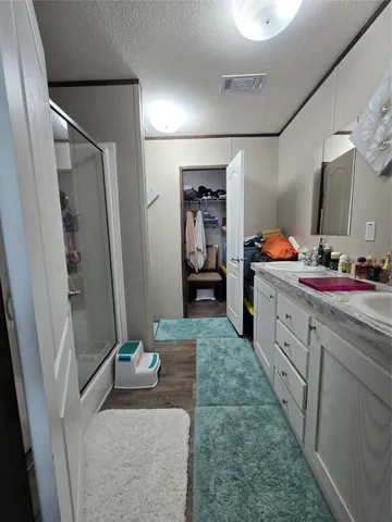 a kitchen with sink refrigerator and stove