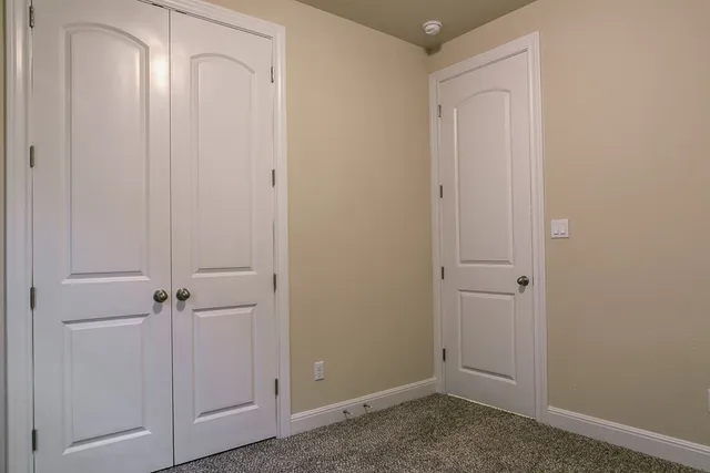 an empty room with closet