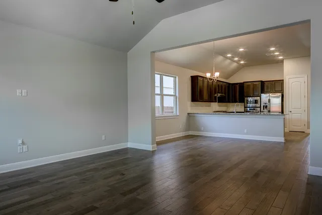a view of a kitchen and window