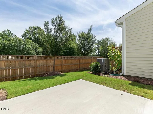 a view of a backyard with a garden