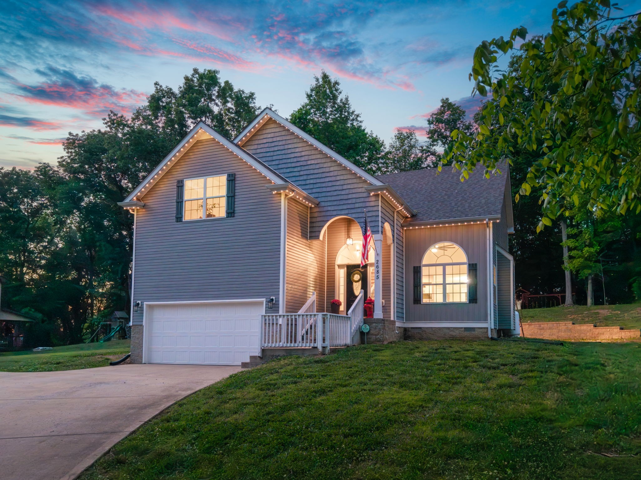 2685 Mockingbird Hill Road Palmyra, TN 37142 - Photo 1 of 47 a front view of a house with garden