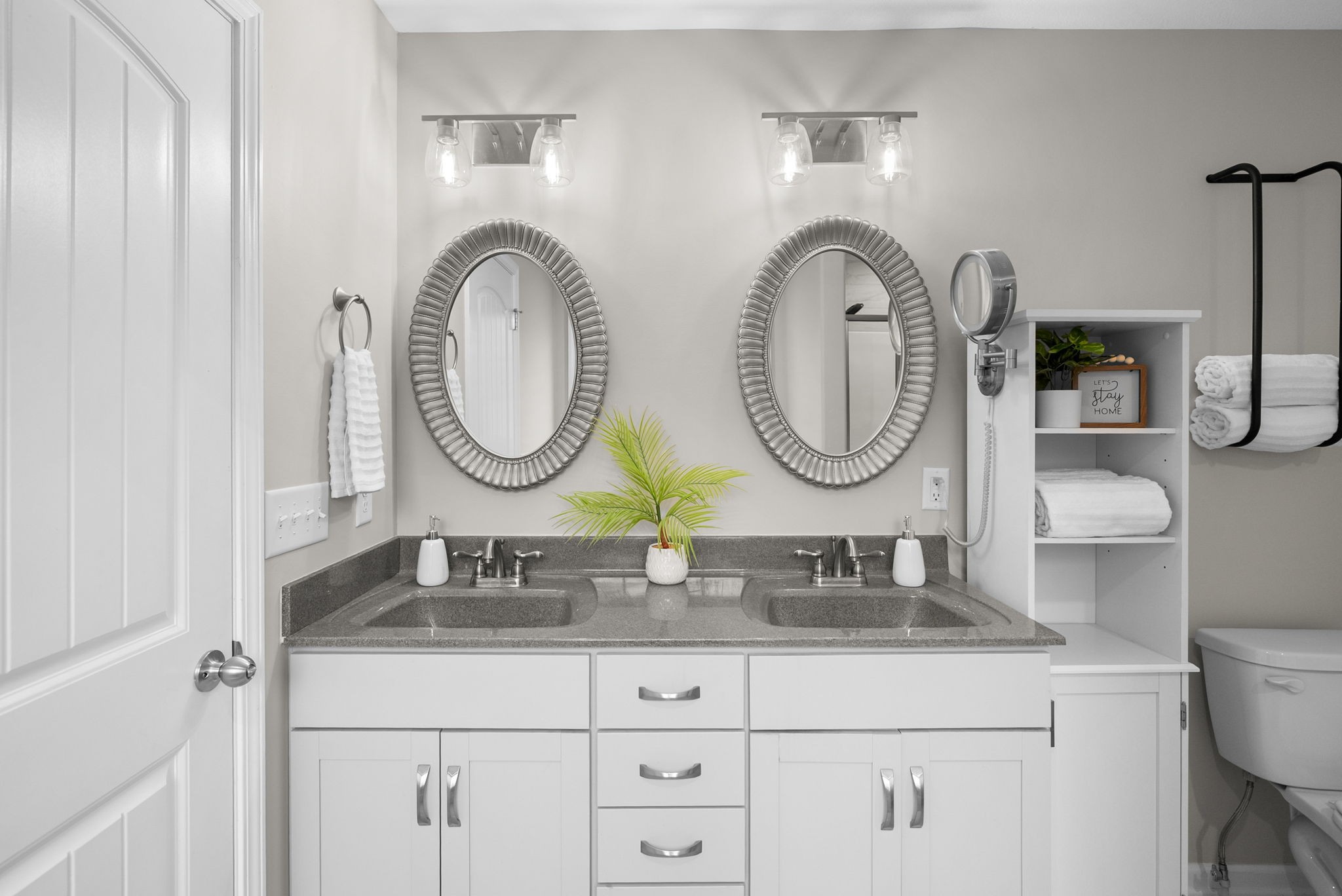 2685 Mockingbird Hill Road Palmyra, TN 37142 - Photo 26 of 47 a bathroom with a granite countertop double vanity sink and a mirror