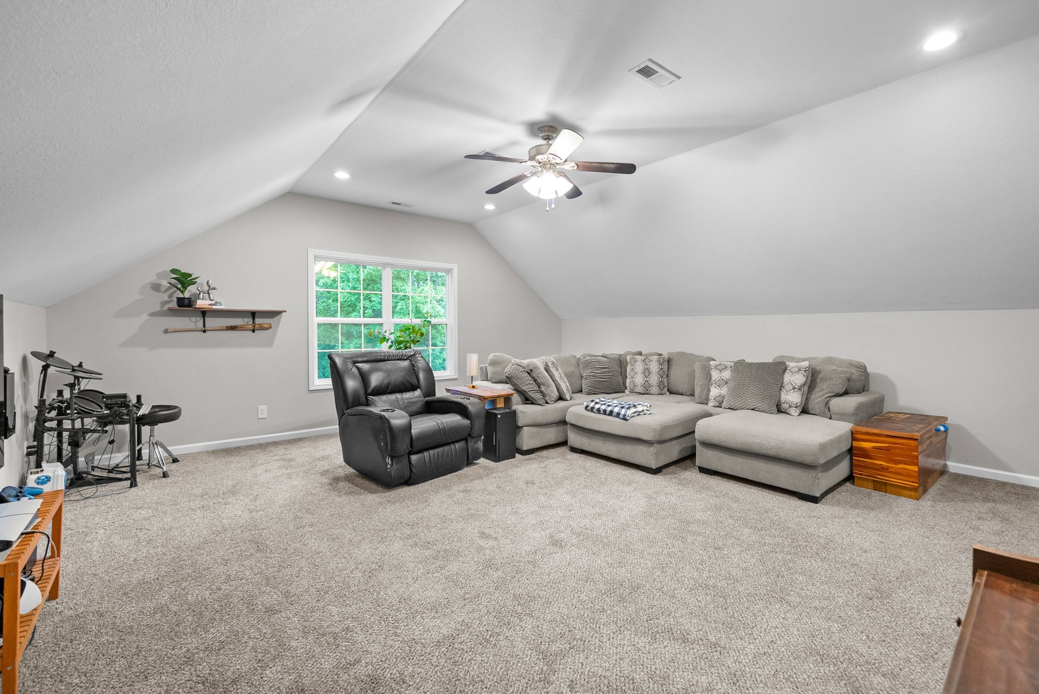 2685 Mockingbird Hill Road Palmyra, TN 37142 - Photo 35 of 47 a living room with furniture and a chandelier