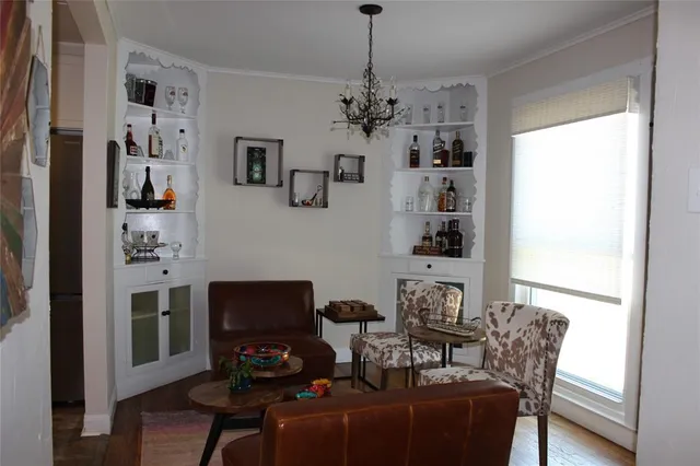 a view of a livingroom with furniture and window